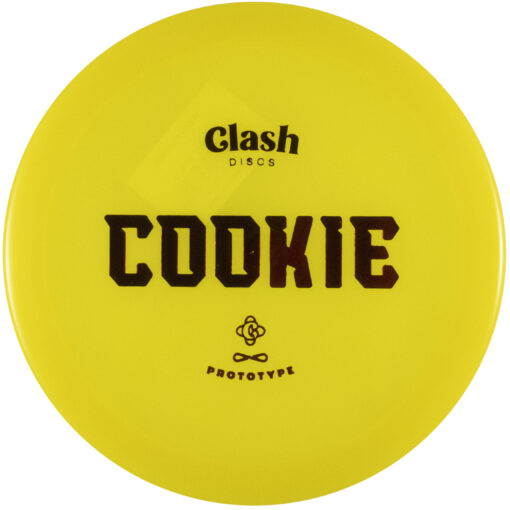 7e04de2a e123 5be2 85fa 08539de2e2f5 The Clash Discs Cookie is a stable to overstable fairway driver. This is a manageable control driver that offers a controllable and consistent flight. The Cookie's rim provides a comfortable grip, helping you to achieve greater confidence in your throw.